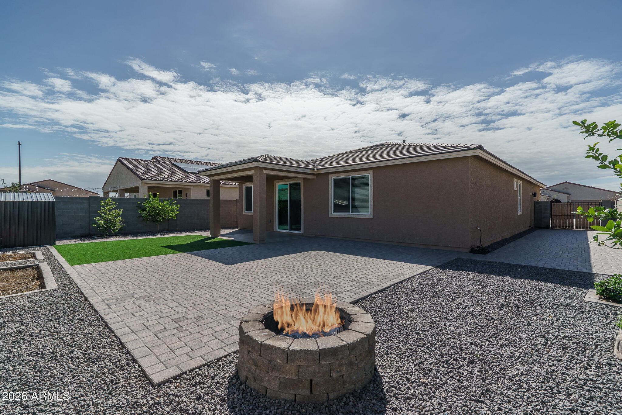 17768 West Raymond Street Goodyear, AZ 85338 - Photo 32 of 38 26) WOOD FIRE PIT