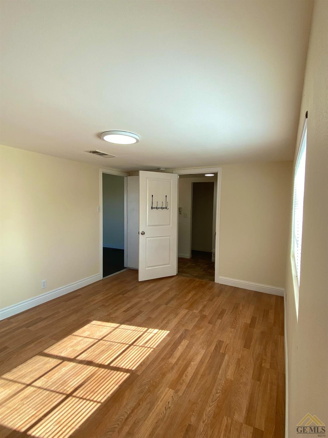 Undisclosed Address Taft, CA 93268 - Photo 15 of 22 a view of an empty room and closet area