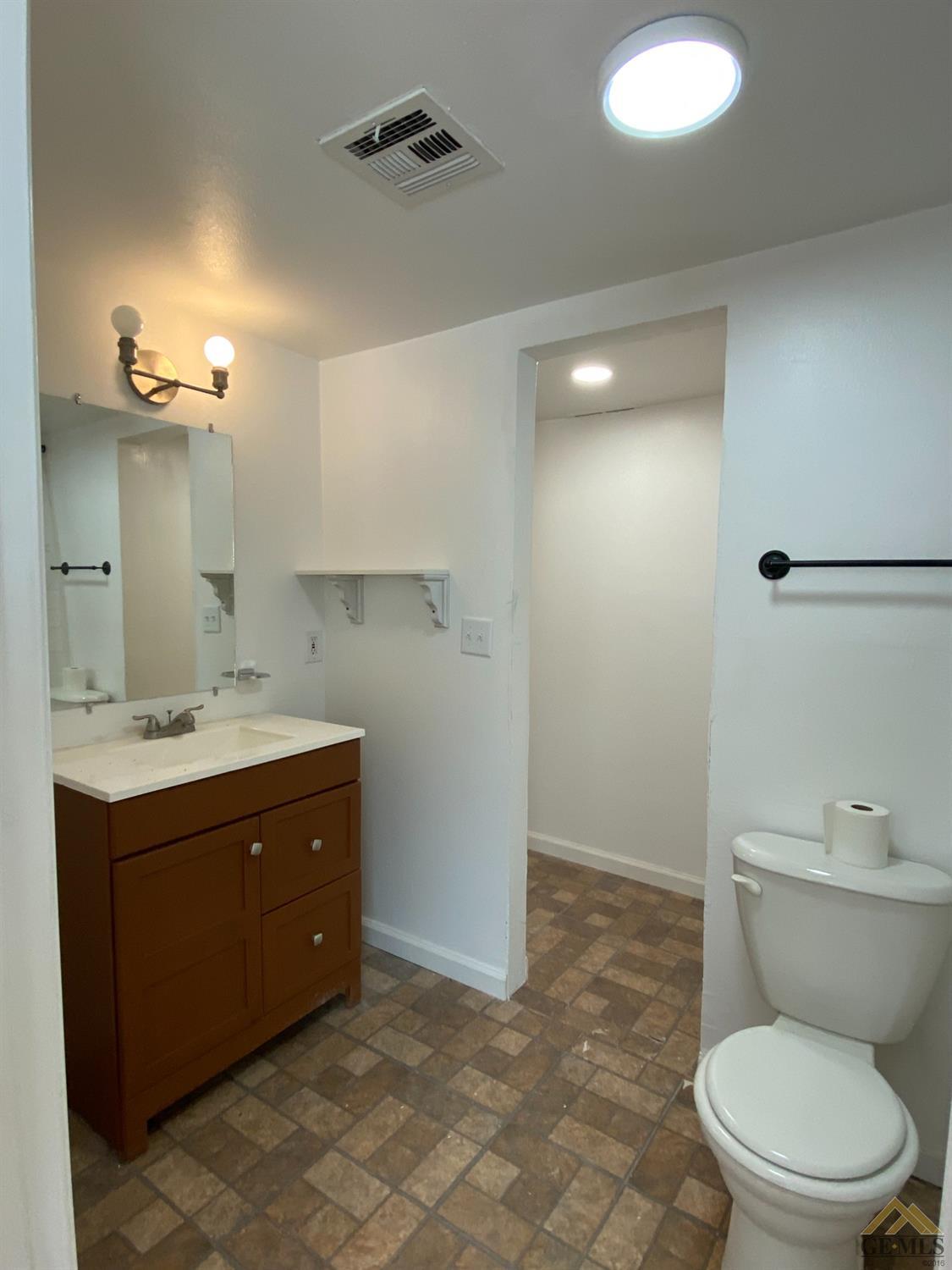 Undisclosed Address Taft, CA 93268 - Photo 17 of 22 a bathroom with a sink a toilet and shower