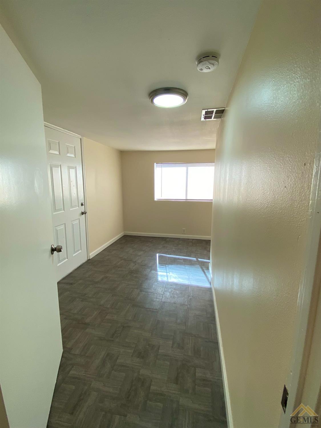 Undisclosed Address Taft, CA 93268 - Photo 5 of 22 wooden floor in an empty room