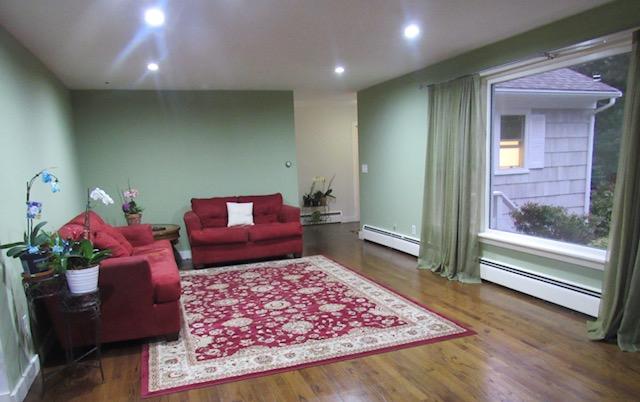 993 Shootflying Hill Road Centerville, MA 02632 - Photo 5 of 21 a living room with furniture and a rug