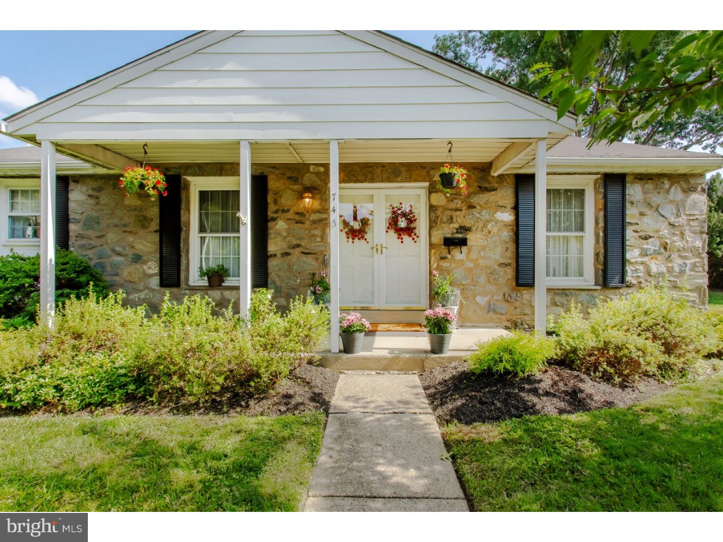 743 West Rolling Road Springfield, PA 19064 - Photo 1 of 19 a view of a house with garden