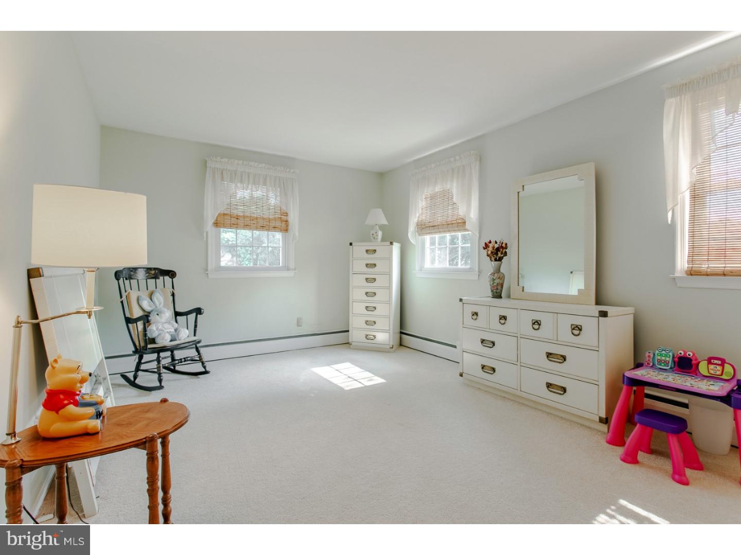 743 West Rolling Road Springfield, PA 19064 - Photo 14 of 19 a bedroom with furniture and a dresser