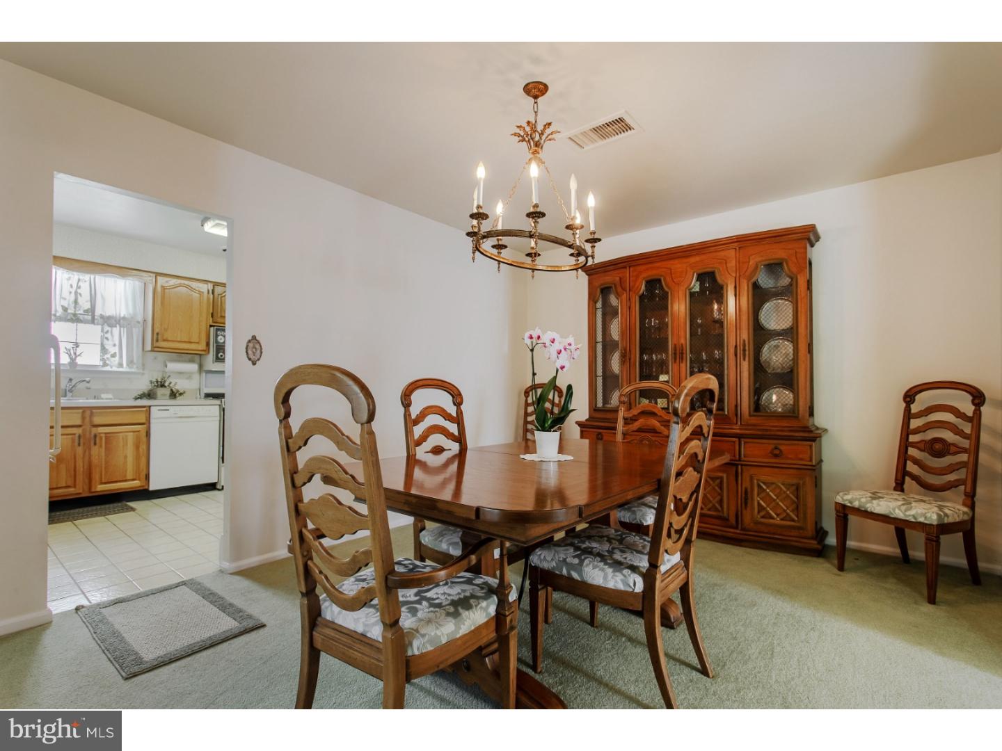 743 West Rolling Road Springfield, PA 19064 - Photo 5 of 19 a view of a dining room with furniture and chandelier