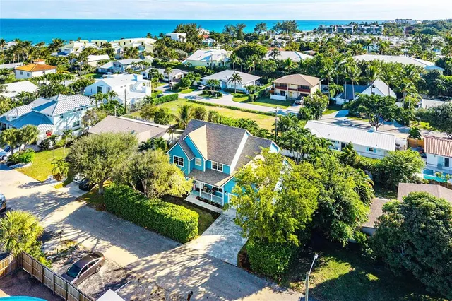 a view of backyard with a garden and stairs