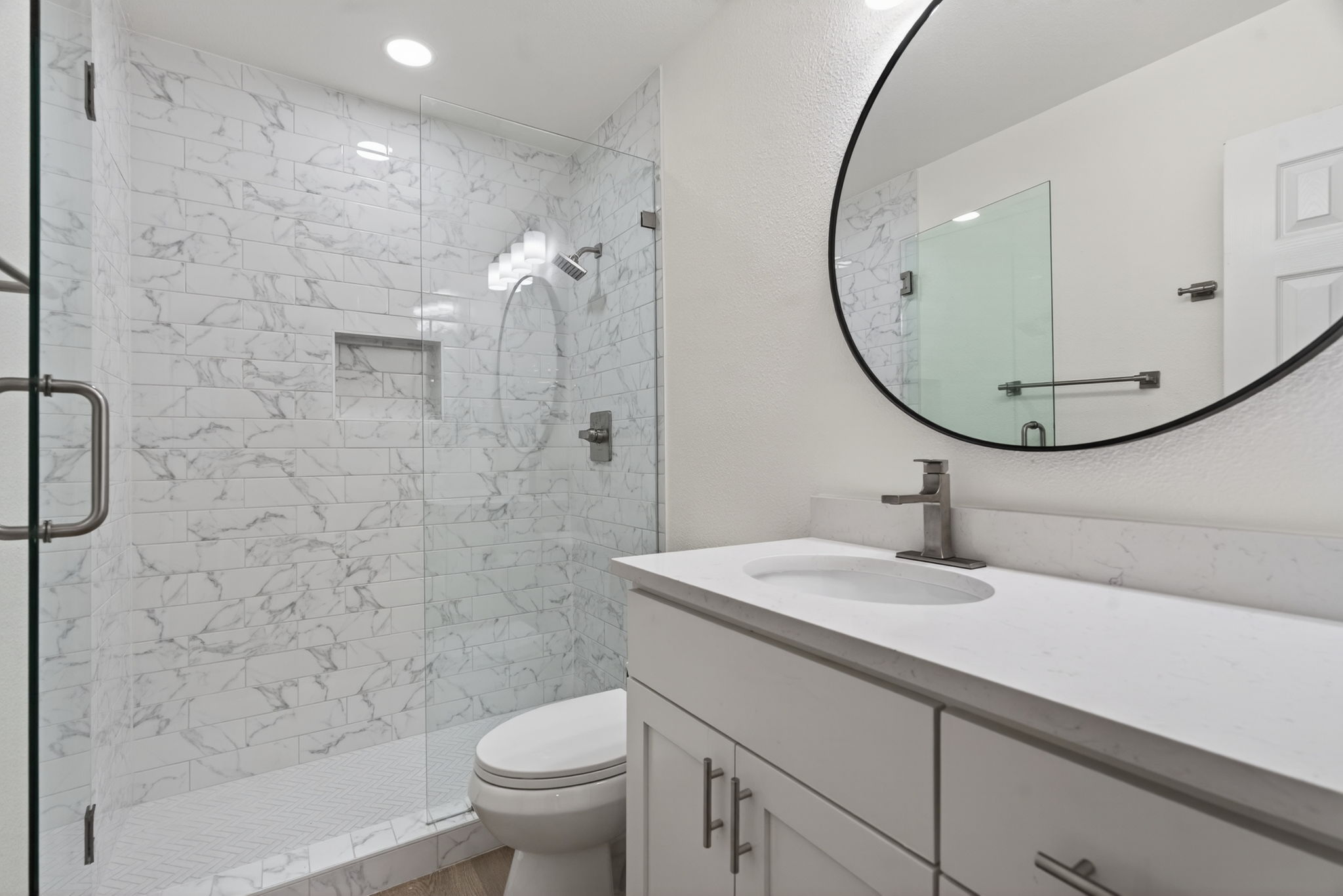 8400 Seminary Ridge Drive Austin, TX 78745 - Photo 25 of 37 Bathroom featuring vanity, a marble finish shower, and recessed lighting