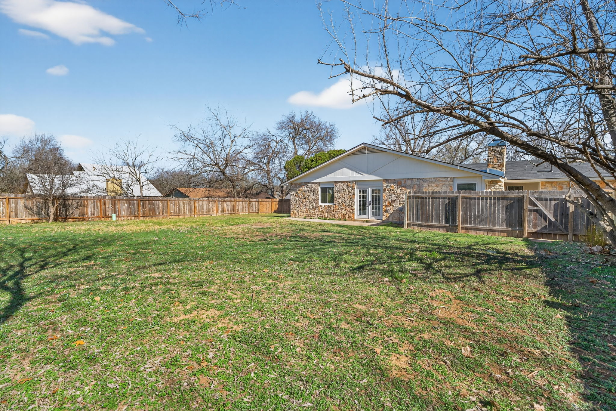 8400 Seminary Ridge Drive Austin, TX 78745 - Photo 30 of 37 Fenced backyard with french doors