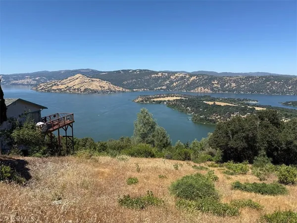 a view of a lake with mountains in the background
