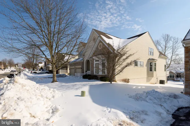 a view of snow on the outside of house