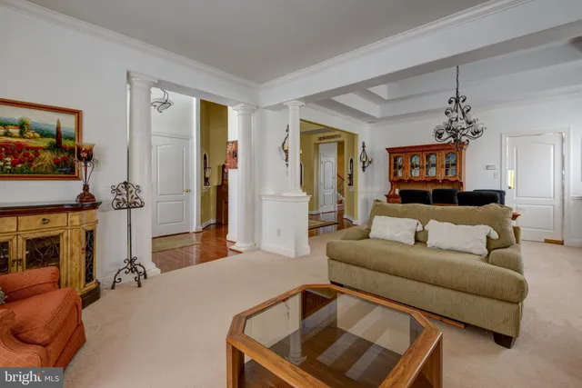 a bed room with furniture and a chandelier