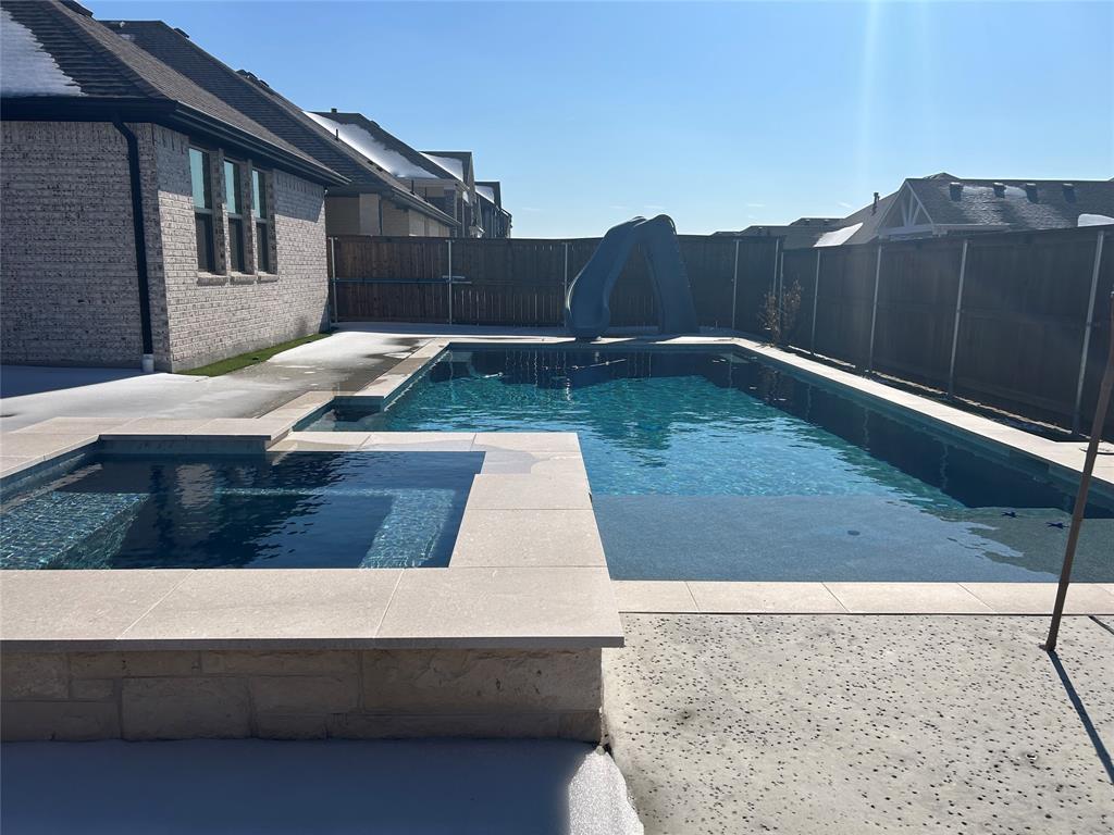 1527 Buckthorn Road Fate, TX 75087 - Photo 2 of 36 a view of backyard with small tub