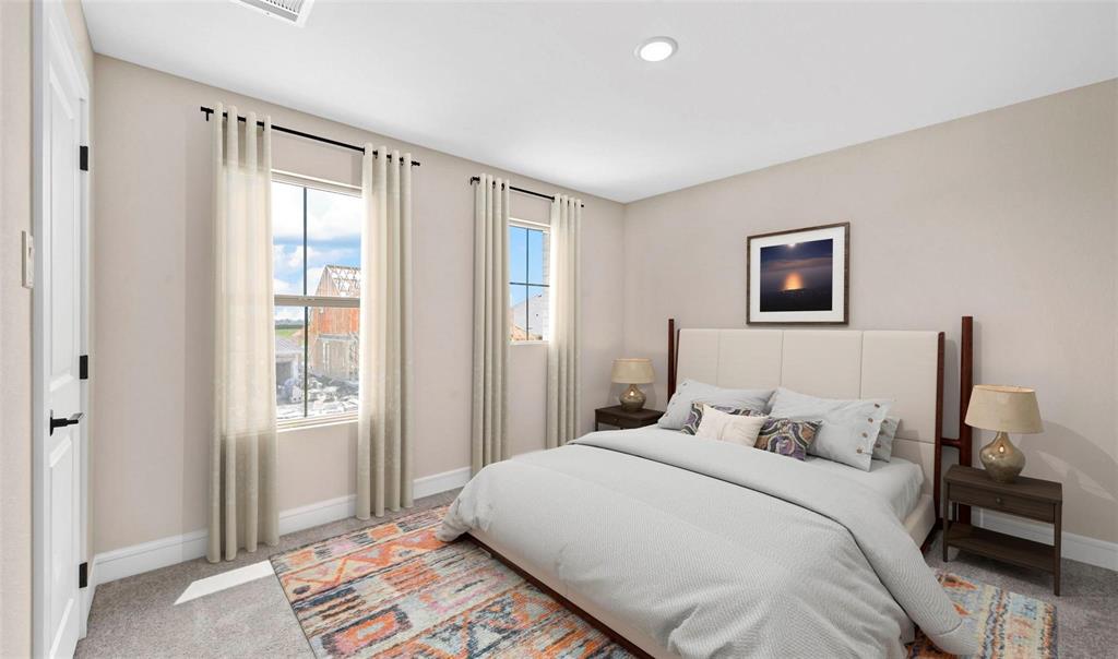 1527 Buckthorn Road Fate, TX 75087 - Photo 23 of 36 a bedroom with a bed and a window