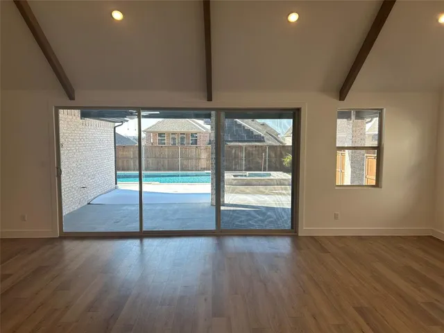 a living room with fireplace furniture and a flat screen tv