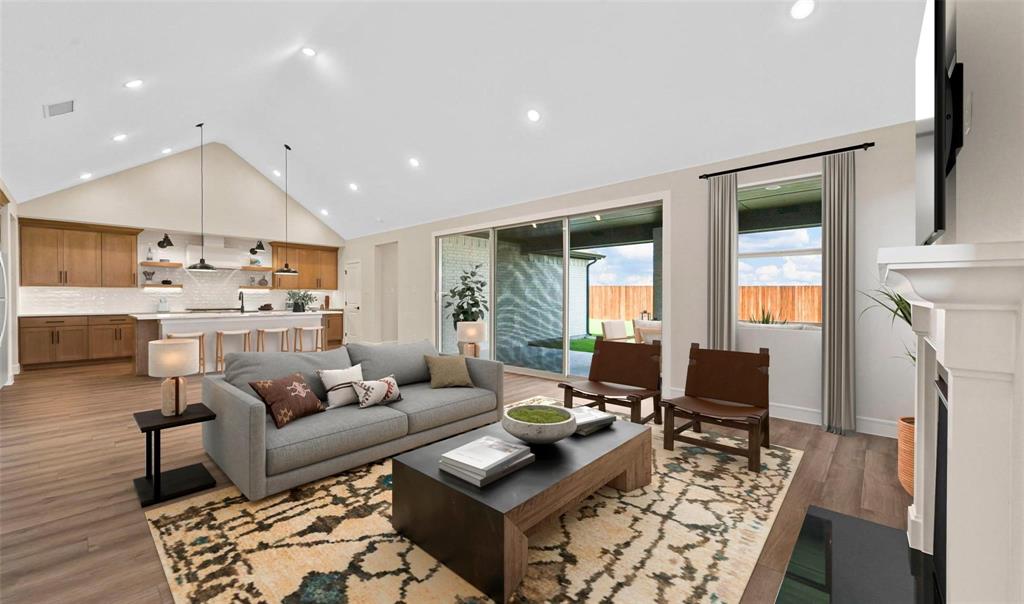 1527 Buckthorn Road Fate, TX 75087 - Photo 8 of 36 a living room with furniture and a large window