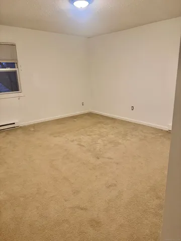 a view of a room with an empty space