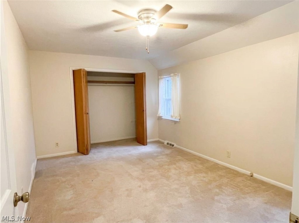 2800 Hillside Road Seven Hills, OH 44131 - Photo 10 of 18 Bedroom featuring neutral tone carpeting and light-colored walls