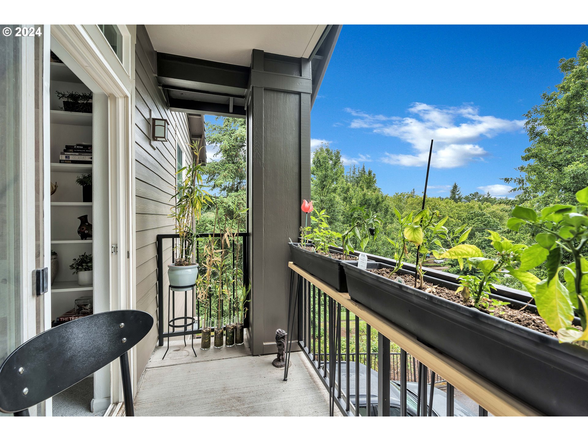 925 Springtree Lane West Linn, OR 97068 - Photo 20 of 24 a view of a balcony with chair and table