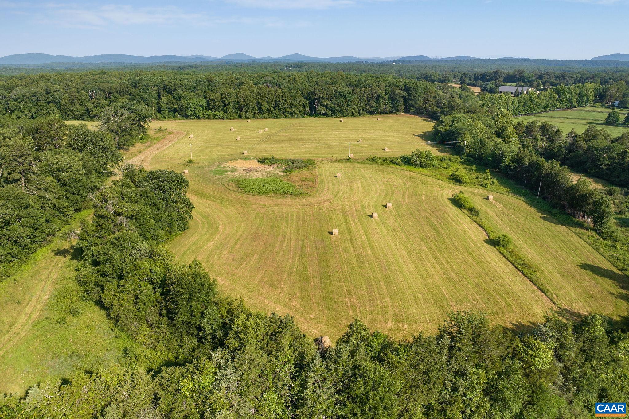 76.99-acres Coles Rolling Road Scottsville, VA 24590 - Photo 22 of 33 a view of lake and mountain