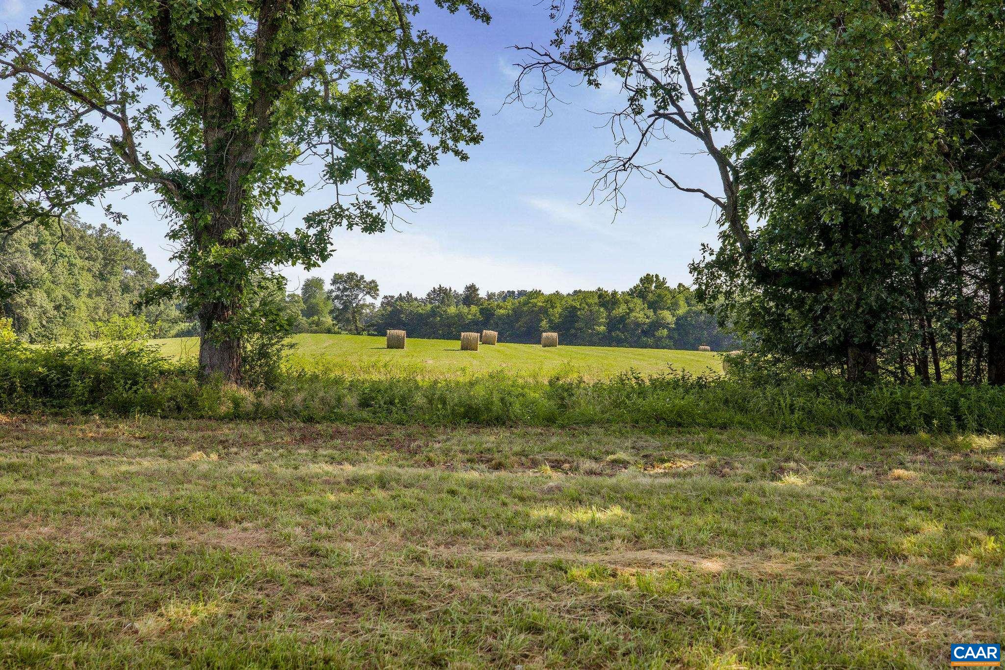 76.99-acres Coles Rolling Road Scottsville, VA 24590 - Photo 5 of 33 a view of a lake with outdoor space