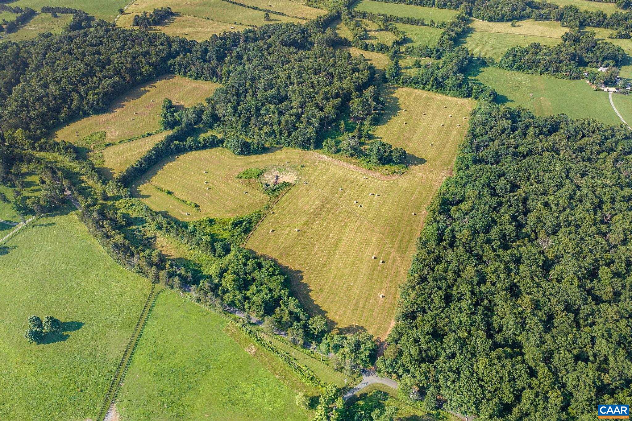 76.99-acres Coles Rolling Road Scottsville, VA 24590 - Photo 7 of 33 an aerial view of a residential houses with outdoor space