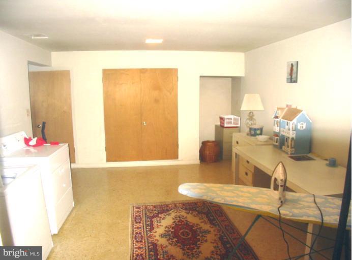 9533 Clement Road Silver Spring, MD 20910 - Photo 4 of 28 Large laundry room in lower level!