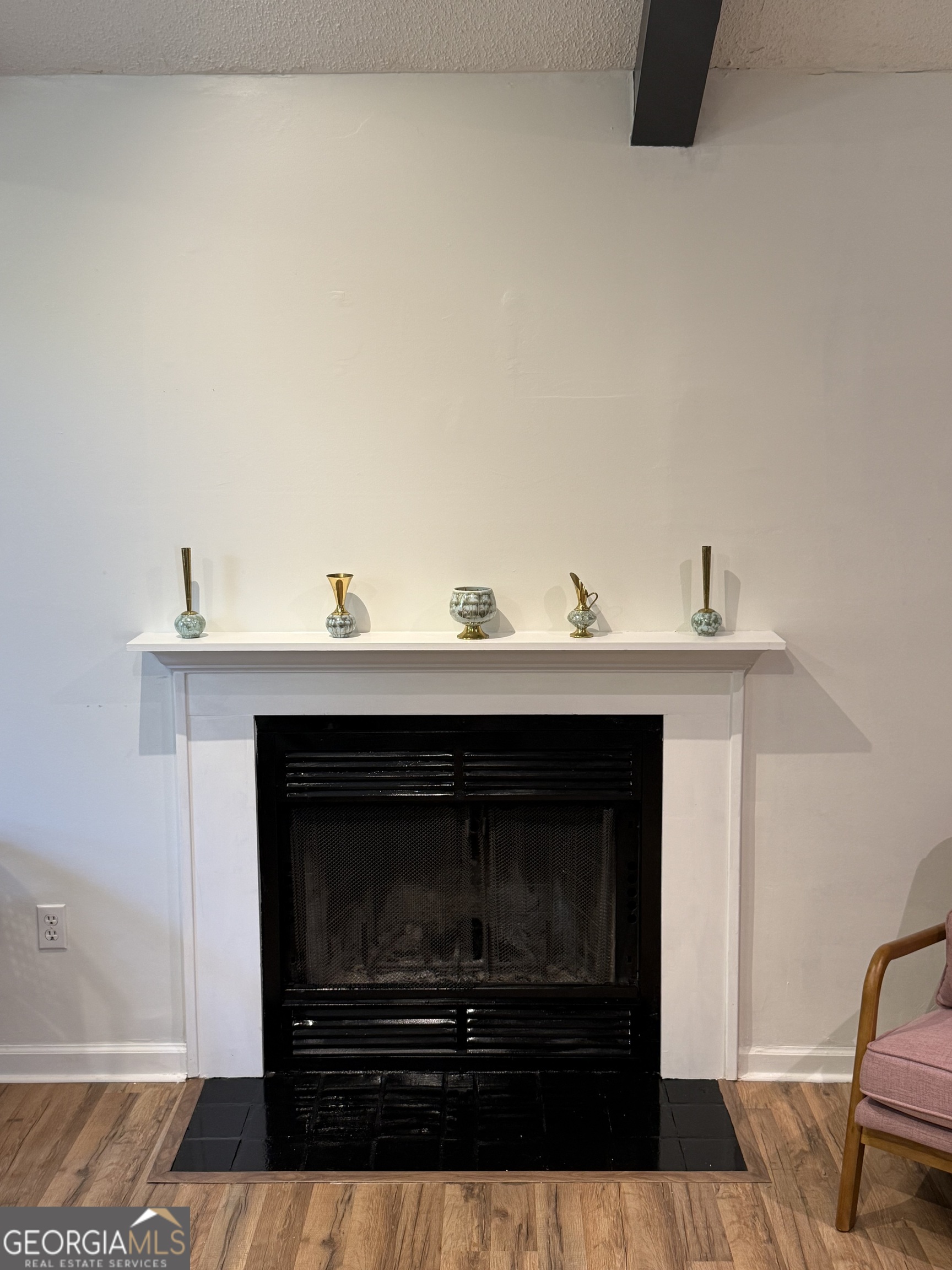 109 Layla Court Athens, GA 30605 - Photo 16 of 32 a living room with a fireplace and a table