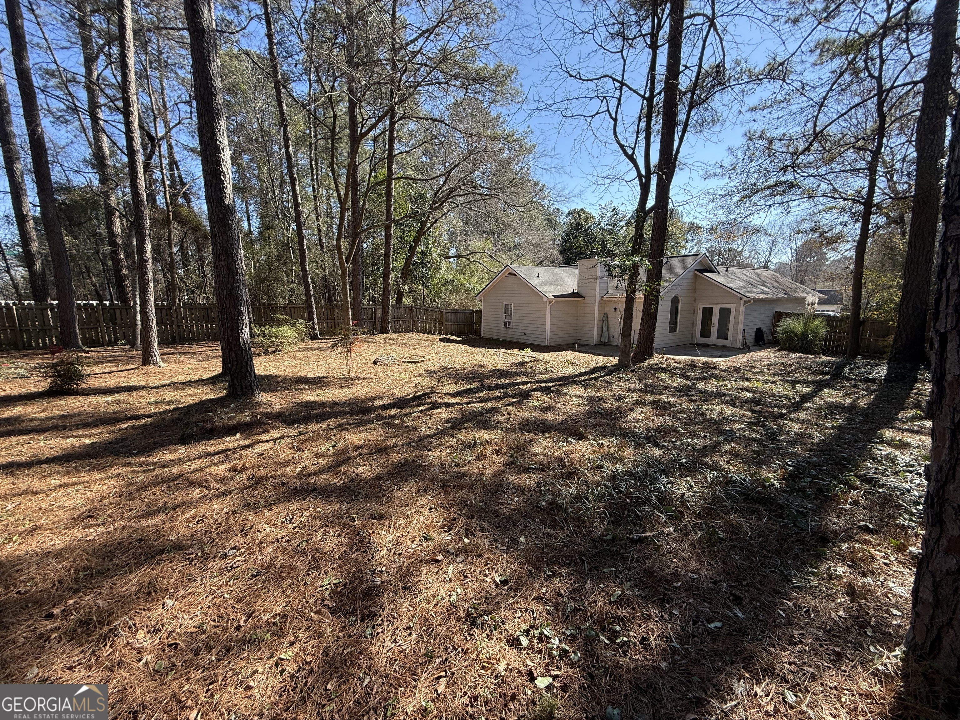 109 Layla Court Athens, GA 30605 - Photo 28 of 32 a view of a yard with plants and trees
