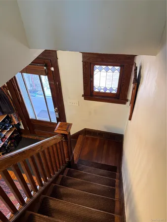 a bedroom with a bed and cabinets
