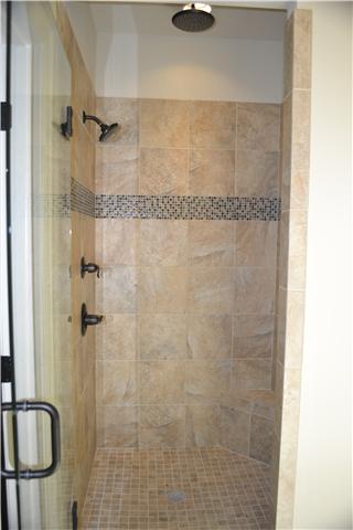 2079 Autumn Ridge Way Spring Hill, TN 37174 - Photo 15 of 19 Master shower w/ rain bird and bench seat.
