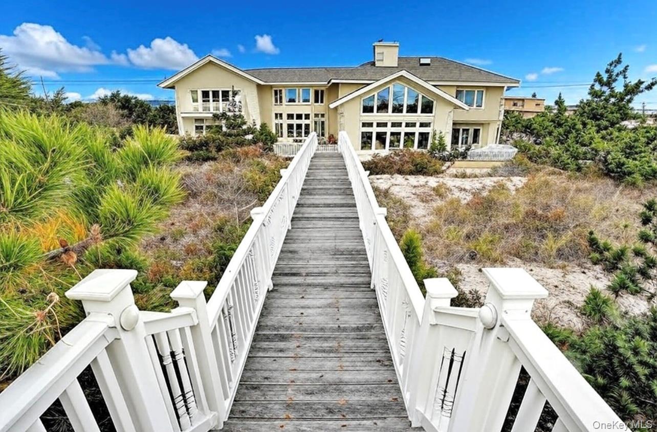 605 Dune Road Westhampton, NY 11978 - Photo 5 of 44 Rear view of property from Walk at Ocean. Its magnificent!