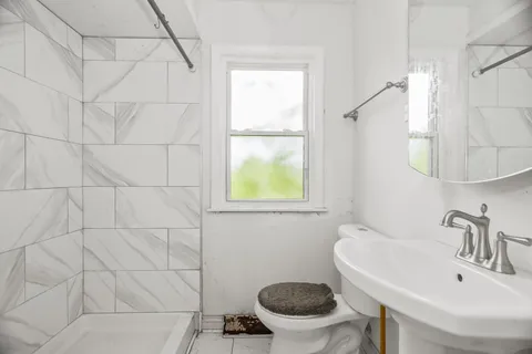 a bathroom with a sink and a toilet