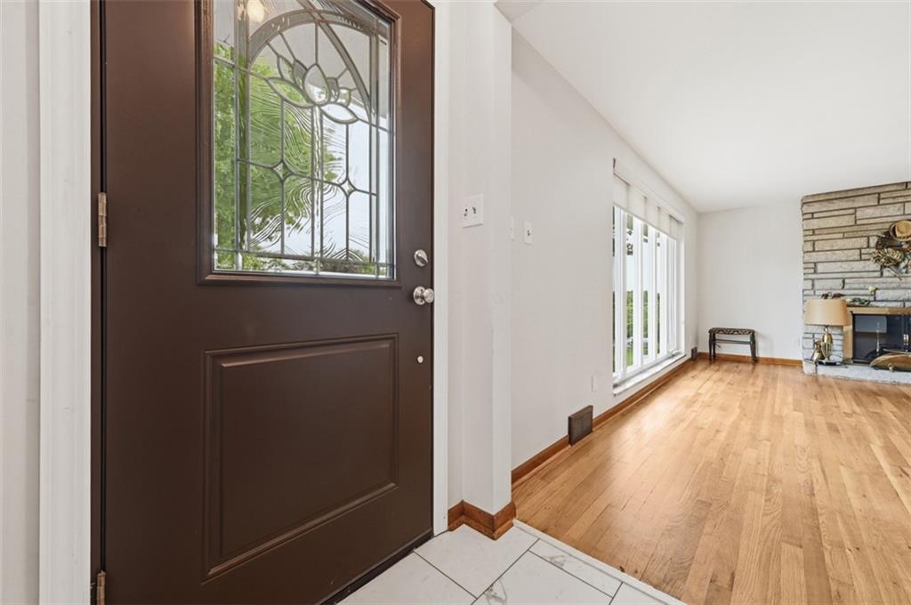 6 Greenview Drive McKees Rocks, PA 15136 - Photo 6 of 44 a view of empty room with wooden floor and fan
