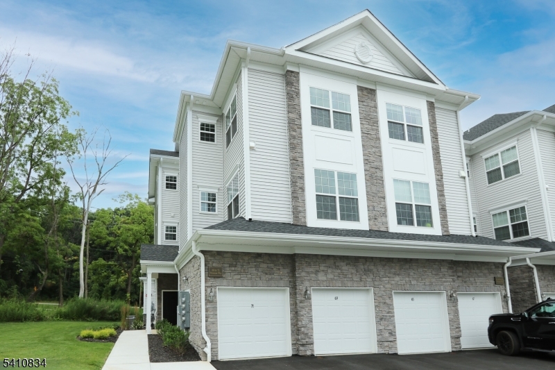 71 Veterans Way Morris Plains, NJ 07950 - Photo 1 of 23 a front view of a house with a yard