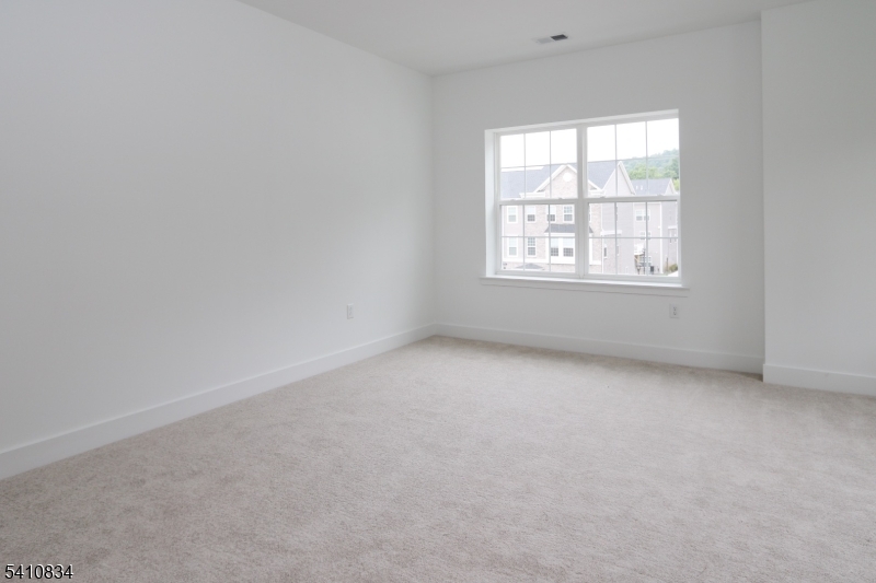 71 Veterans Way Morris Plains, NJ 07950 - Photo 13 of 23 an empty room with a window