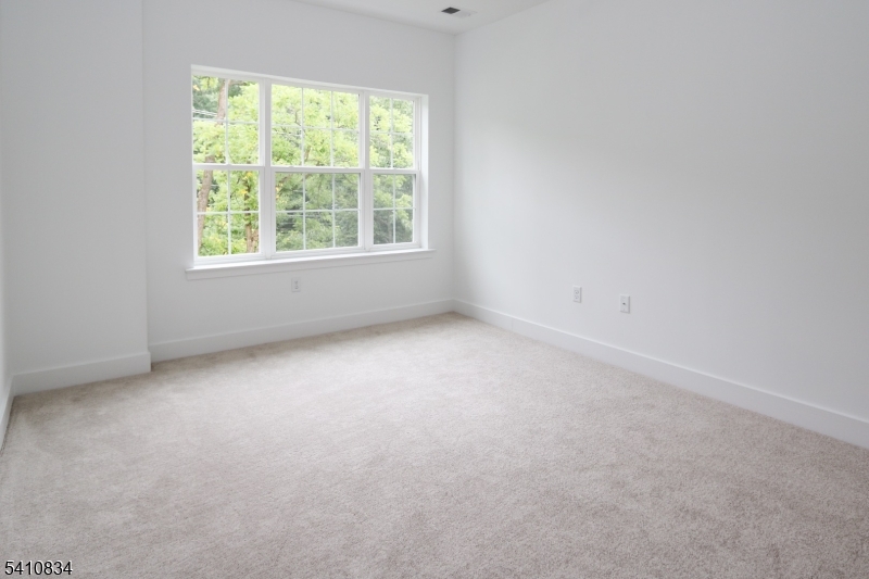 71 Veterans Way Morris Plains, NJ 07950 - Photo 18 of 23 an empty room with a window