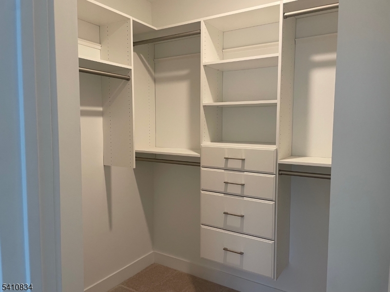 71 Veterans Way Morris Plains, NJ 07950 - Photo 23 of 23 a view of an empty walk in closet