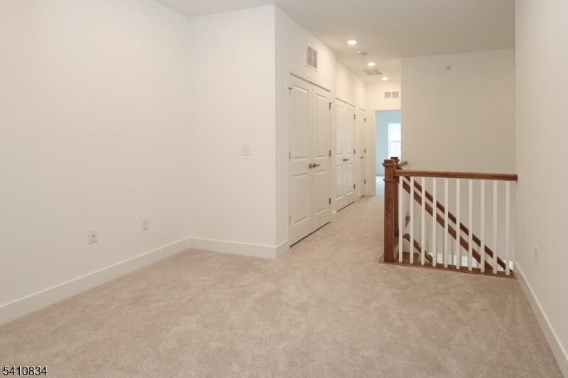 71 Veterans Way Morris Plains, NJ 07950 - Photo 10 of 23 a view of hallway with windows