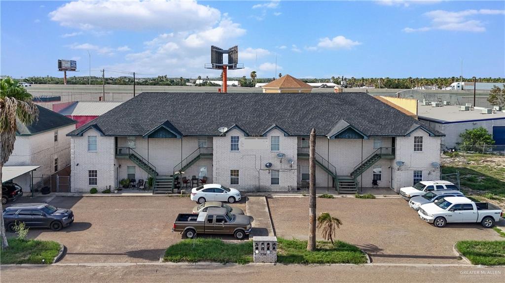 3716 Clavel Street, Unit 2 Palmview, TX 78572 - Photo 1 of 8 a view of city street with a parked cars