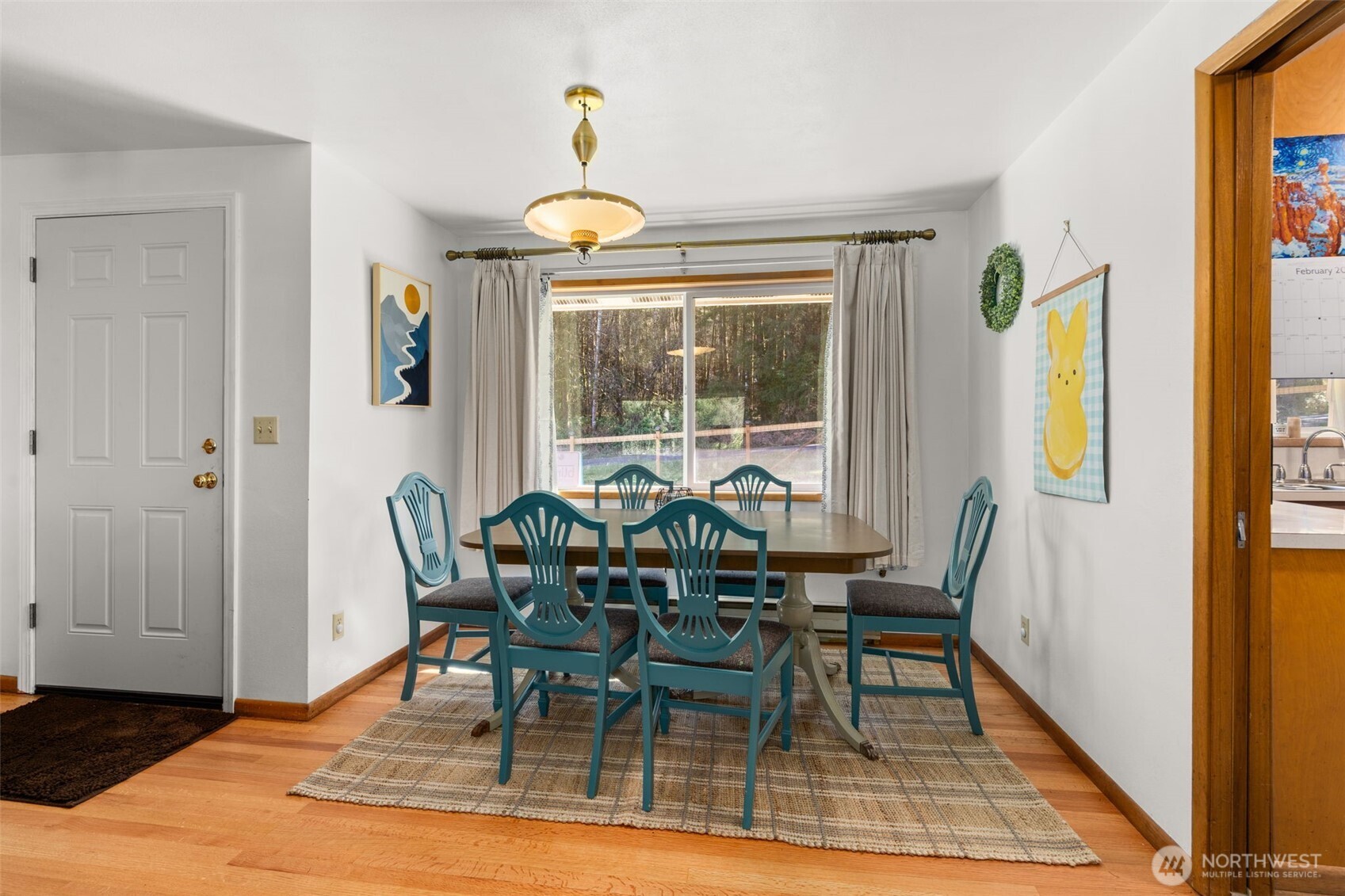 810 King Road Winlock, WA 98596 - Photo 12 of 27 a view of a dining room with furniture and a window