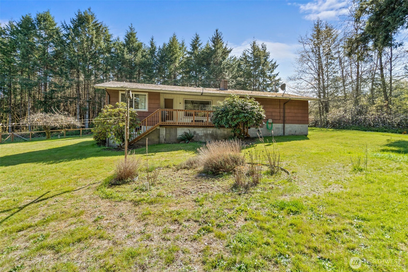810 King Road Winlock, WA 98596 - Photo 24 of 27 a view of a house with backyard and sitting area