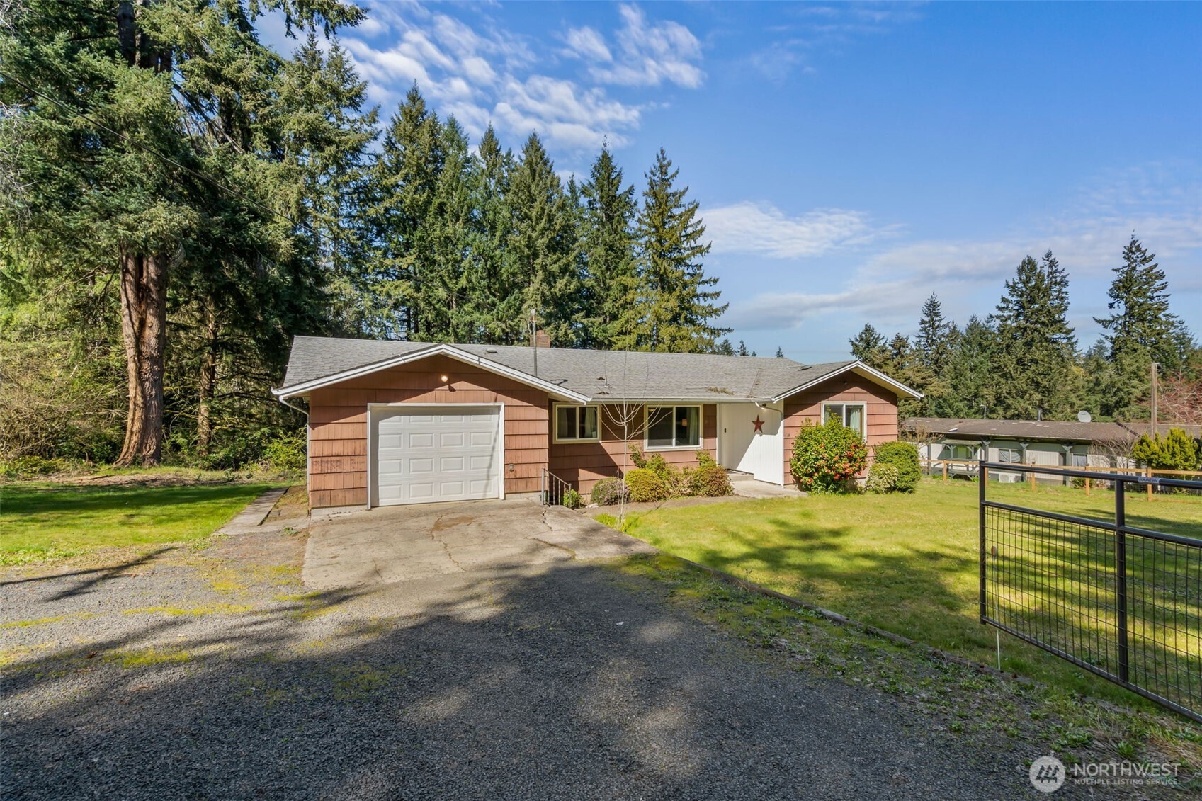 810 King Road Winlock, WA 98596 - Photo 3 of 27 a view of a house with a yard and large tree