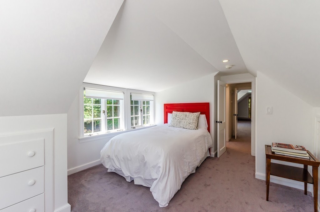 2 Old Colony Road Weston, MA 02493 - Photo 19 of 25 a bedroom with a bed and a window