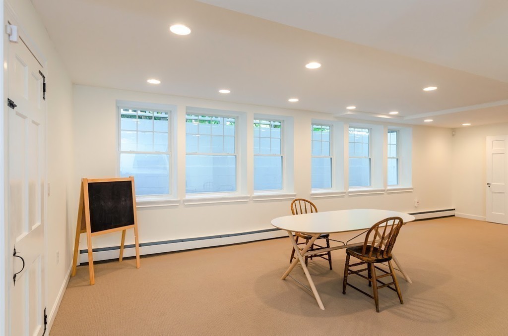 2 Old Colony Road Weston, MA 02493 - Photo 23 of 25 a view of a room with gym equipment and windows
