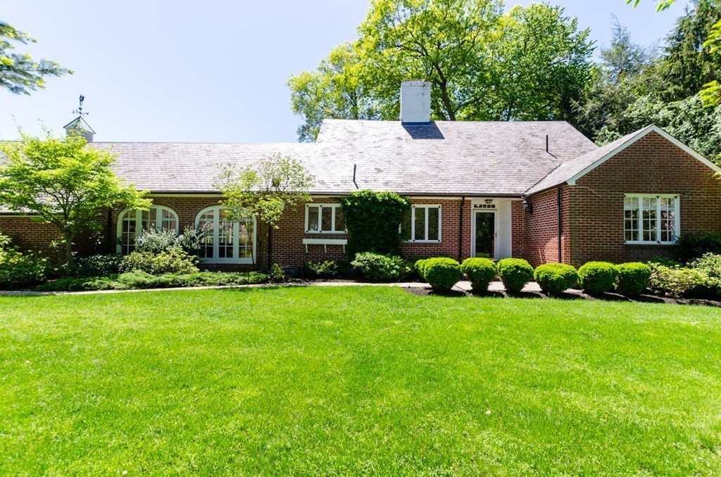 2 Old Colony Road Weston, MA 02493 - Photo 3 of 25 a front view of a house with garden
