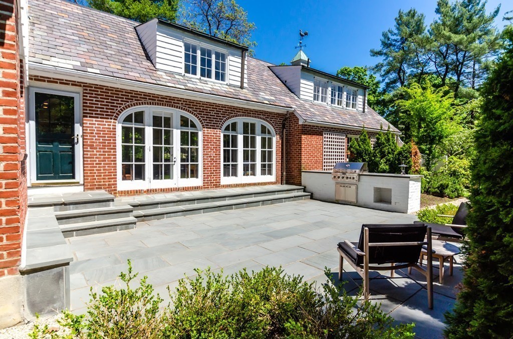 2 Old Colony Road Weston, MA 02493 - Photo 4 of 25 front view of a house with a garden
