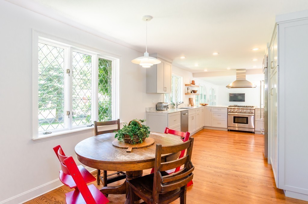 2 Old Colony Road Weston, MA 02493 - Photo 5 of 25 a kitchen with a table and chairs in it