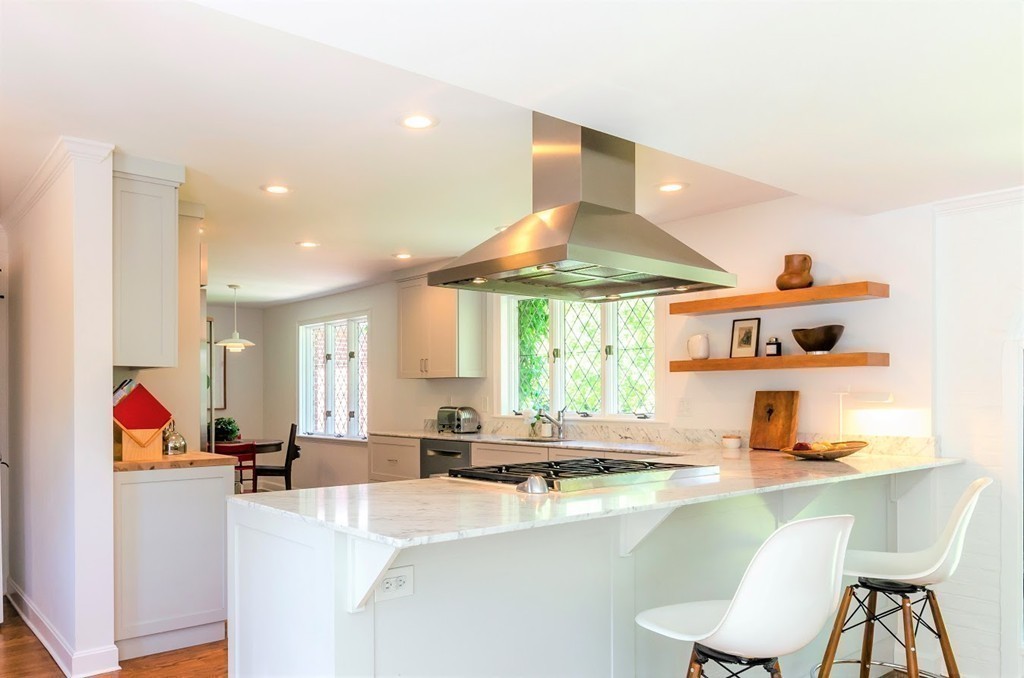 2 Old Colony Road Weston, MA 02493 - Photo 9 of 25 a kitchen with stainless steel appliances granite countertop a sink and a refrigerator