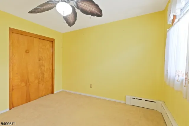 a bedroom with a bed