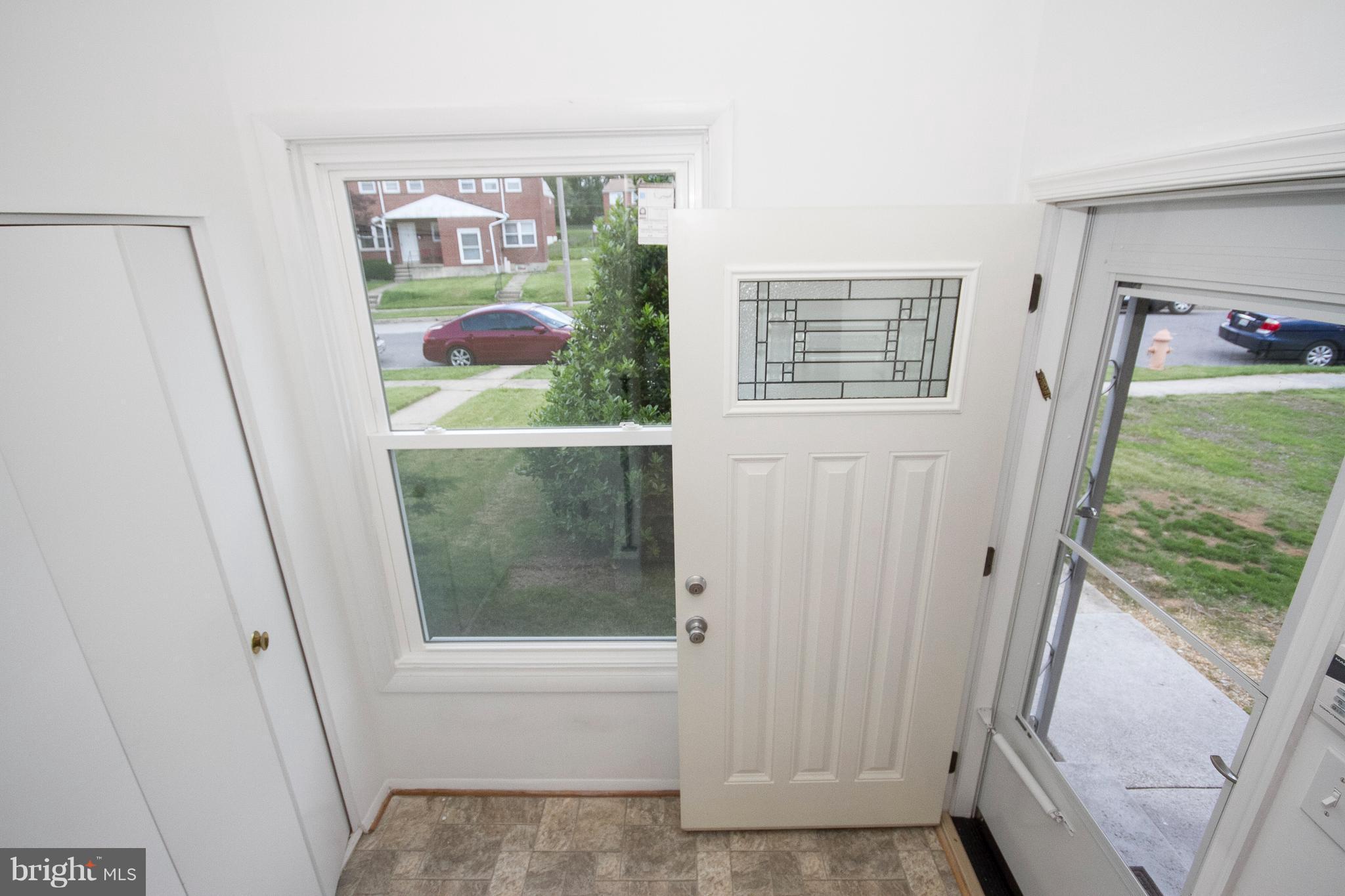 6936 Blanche Road Baltimore, MD 21215 - Photo 2 of 15 a bathroom with a toilet and a shower