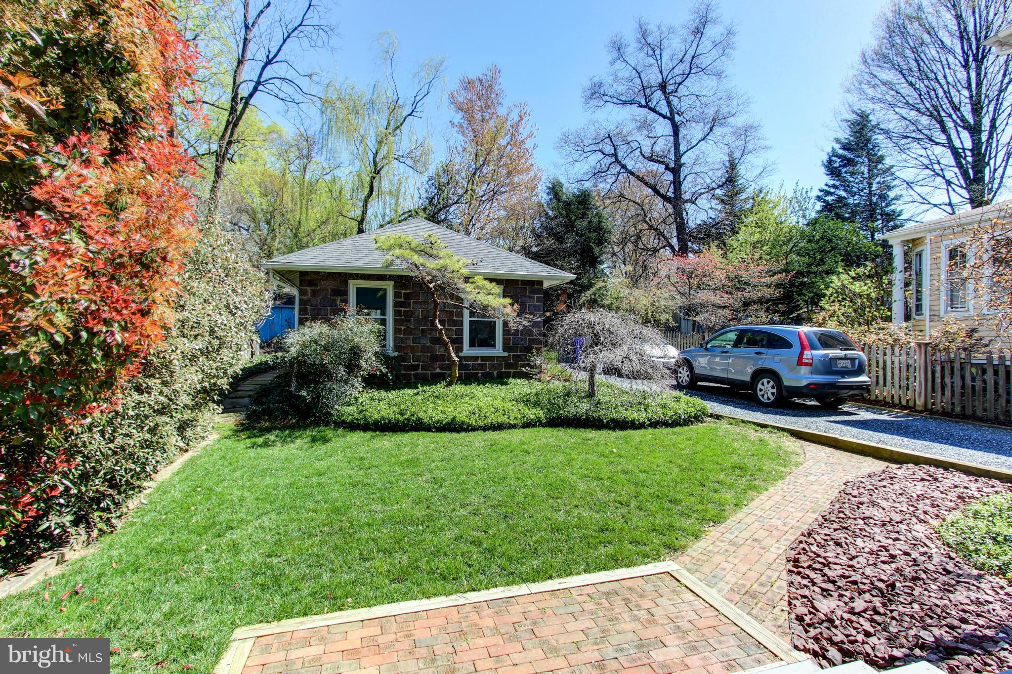 9405 Monroe Street Silver Spring, MD 20910 - Photo 22 of 24 a front view of a house with garden